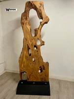 Piantana di design realizzata in sezione in legno massello di ulivo secolare con base in acciao