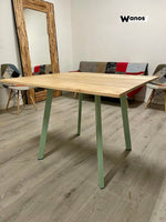 Table with top made of solid chestnut wood on a minimal metal structure