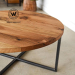 Circular Coffee Table made with solid chestnut wood top on metal structure.