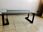 Design table made of wrought iron and glass