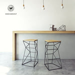 Design stool made of metal with seat in solid natural oak