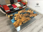 Coffee Table di design realizzato con radice di ulivo secolare immerso in resina effetto acqua marina su struttura in metallo bianco opaco