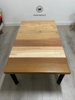 Design Coffee Table with solid wood top with seven different essences on a geometric structure in matt black metal