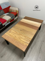 Design Coffee Table with solid wood top with seven different essences on a geometric structure in matt black metal