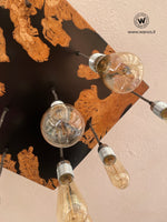 Lampadario di design con 11 punti luce in legno massello di ulivo e resina di colore nero