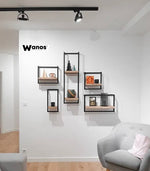 Design shelves made of solid chestnut wood on a metal structure