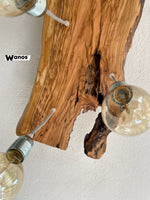 Lampadario di design realizzato con asse di ulivo secolare con 7 punti luce