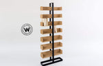 Libreria di design realizzata su struttura in ferro con ripiani in legno massello nobile