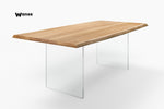 Design table made of solid oak wood on acrylic crystal