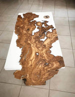 Design Coffee Table made with centuries-old olive root immersed in white epoxy resin