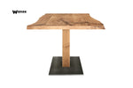 Design table made of solid oak wood on a central metal structure in wood and metal