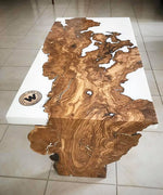 Design Coffee Table made with centuries-old olive root immersed in white epoxy resin