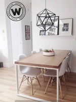 Table in solid ash wood on a handcrafted matt white iron structure