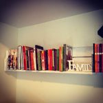Libreria in legno massello da parete