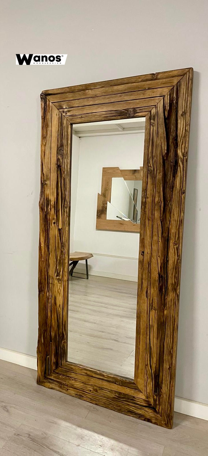 Design mirror with secular olive briar frame