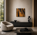 Design wall clock made of centuries-old olive briar immersed in black resin
