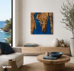 Orologio da parete di design realizzato in legno massello di ulivo secolare immerso in resina blu oceano