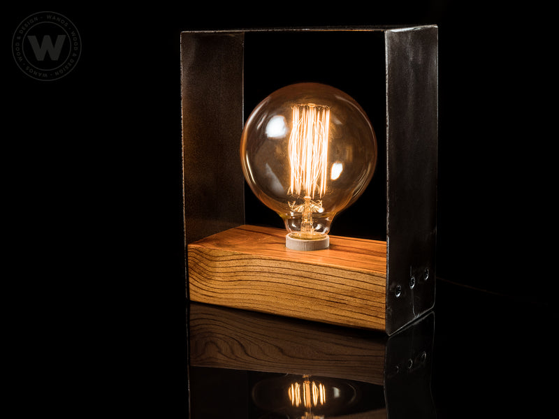 Design table lamp in wrought iron and handcrafted solid wood