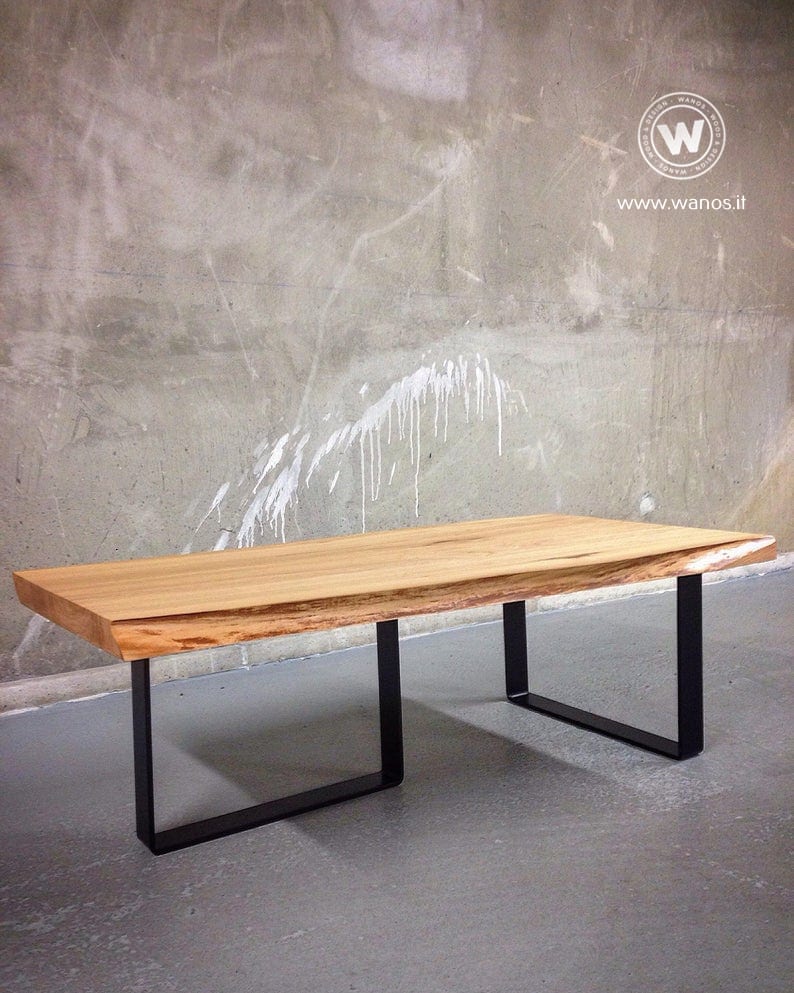Design Coffee Table made of solid debarked chestnut wood on a metal structure