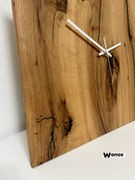Wall clock made of solid aged oak wood