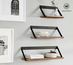 Design shelves made of solid chestnut wood on a metal structure