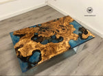 Coffee Table di design realizzato con radice di ulivo secolare immerso in resina effetto acqua marina su struttura in metallo bianco opaco