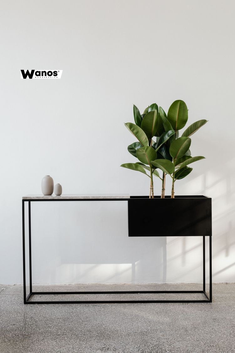 Console in matt black metal with integrated vase holder