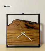 Design wall clock made of solid antique chestnut wood with matt black metal structure