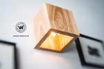 Wall light made of solid natural chestnut wood