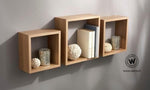 Wall cube made of solid wood of modern design