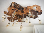 Design chandelier made of centuries-old olive root with 16 light points
