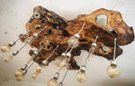 Design chandelier made of centuries-old olive root with 16 light points