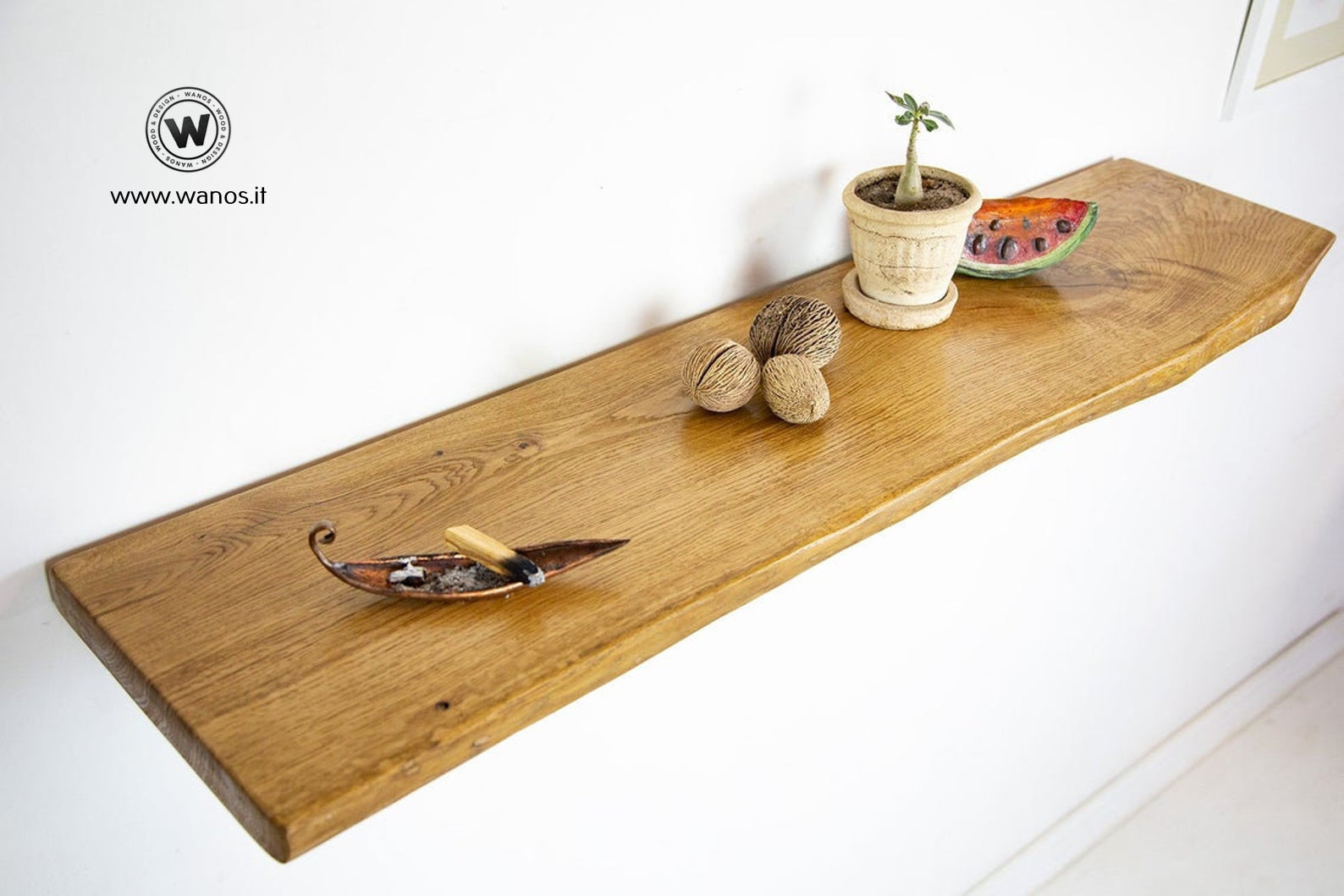 Design shelves made of solid debarked oak with concealed installation