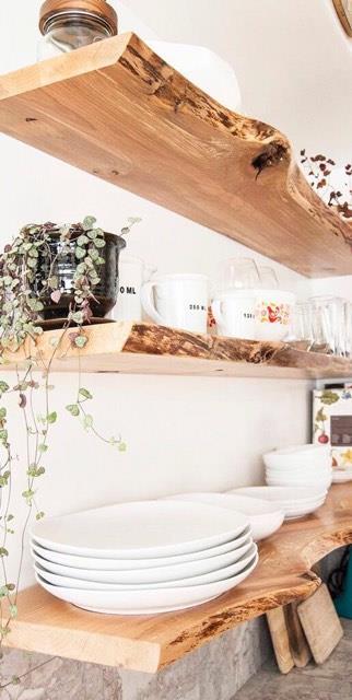 Design shelves made of solid debarked chestnut wood with concealed  installation