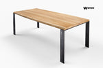 Tavolo di design realizzato in legno massello di rovere su struttura in metallo salvaspazio