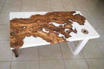 Coffee Table di design realizzato con radice di ulivo secolare immerso in resina epossidica bianca