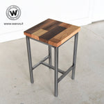 Sgabello di design realizzato con seduta in legno massello multi essence su struttura in metallo
