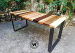 Multi essence designer table made with sections of noble solid wood