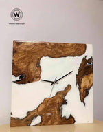 Design wall clock made with secular olive root and white resin