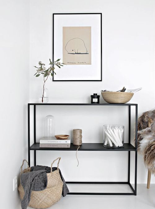Design console made of metal with double shelf