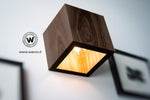 Wall light made of solid natural chestnut wood
