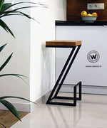 Design iron stool with seat in solid chestnut wood 